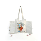White tote bag with artistic design on a white background