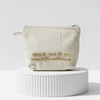 Gota Patti-Embroidered Cream Cotton Travel Pouch - Gold Floral
