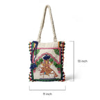 Handbag with colorful design and measurements on a white background