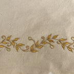 Gota Patti-Embroidered Cream Travel Pouch with Gold Vine Detail