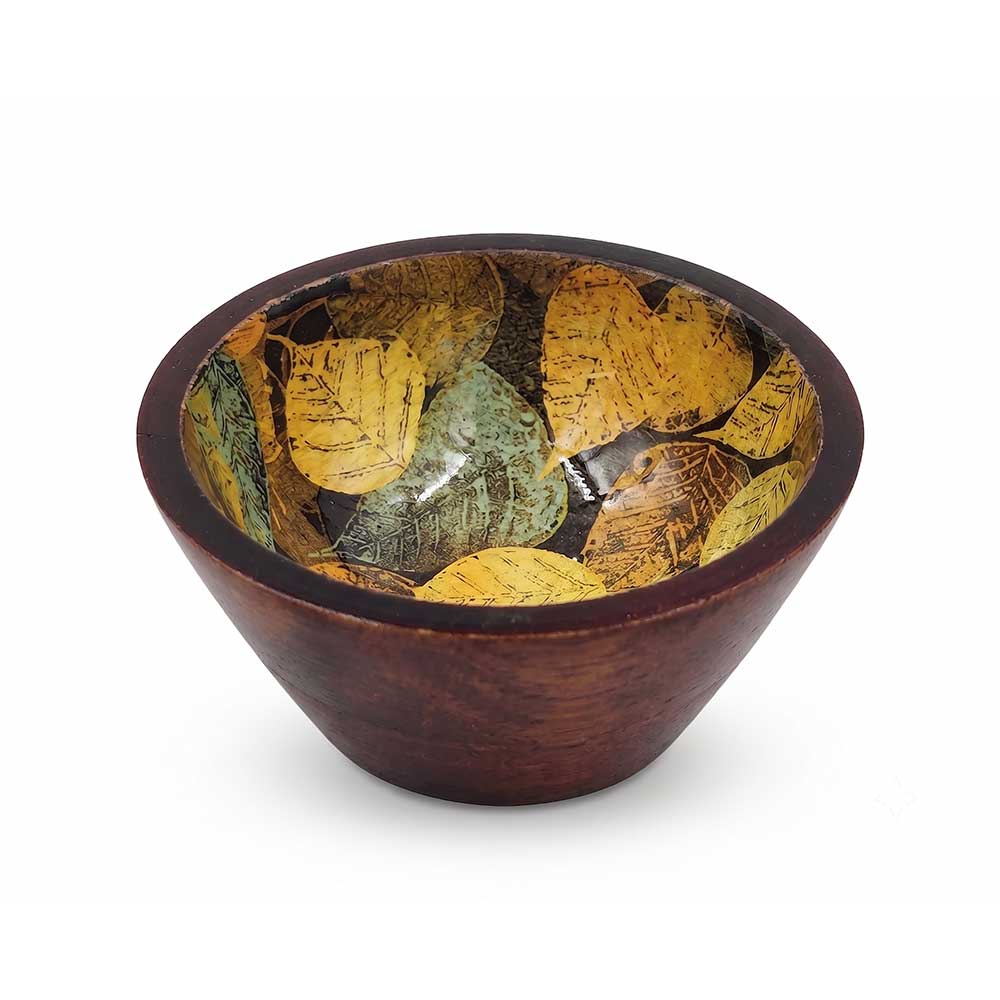 Top-down overhead view of enamel printed mango wood bowl highlighting glossy leaf artwork interior