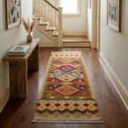 Decorative rug with geometric pattern on wooden floor in a home setting