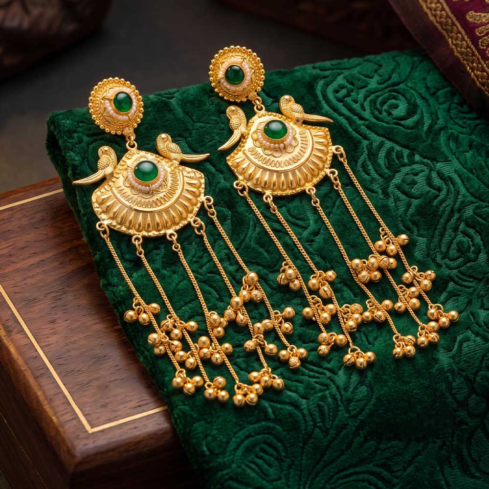 Side angle of elegant traditional peacock jhumka earrings with gold plating