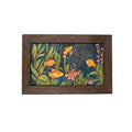 Hand-carved stone wall art sculpture featuring colorful fish and aquatic plants in a dark wood frame, front view.