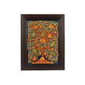 Front view of a rectangular hand-carved stone tree of life painting in a dark wood frame