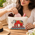 Detailed close-up of intricate hand-painted elephant motif and canvas texture