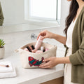 In-use image showing the cotton pouch being used to store personal accessories.