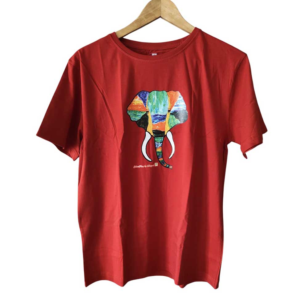 Front view of a red cotton t-shirt featuring a vibrant, hand-painted colorful elephant illustration.