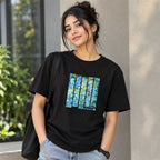 Close-up detail of the hand-painted abstract art on the black cotton T-shirt.