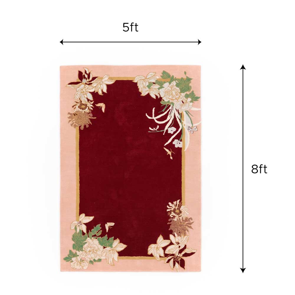 Detailed view of hand-tufted floral pattern on New Zealand wool rug