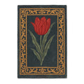 Hand-tufted New Zealand wool rug with a central red tulip design and ornate golden border on a dark charcoal background.