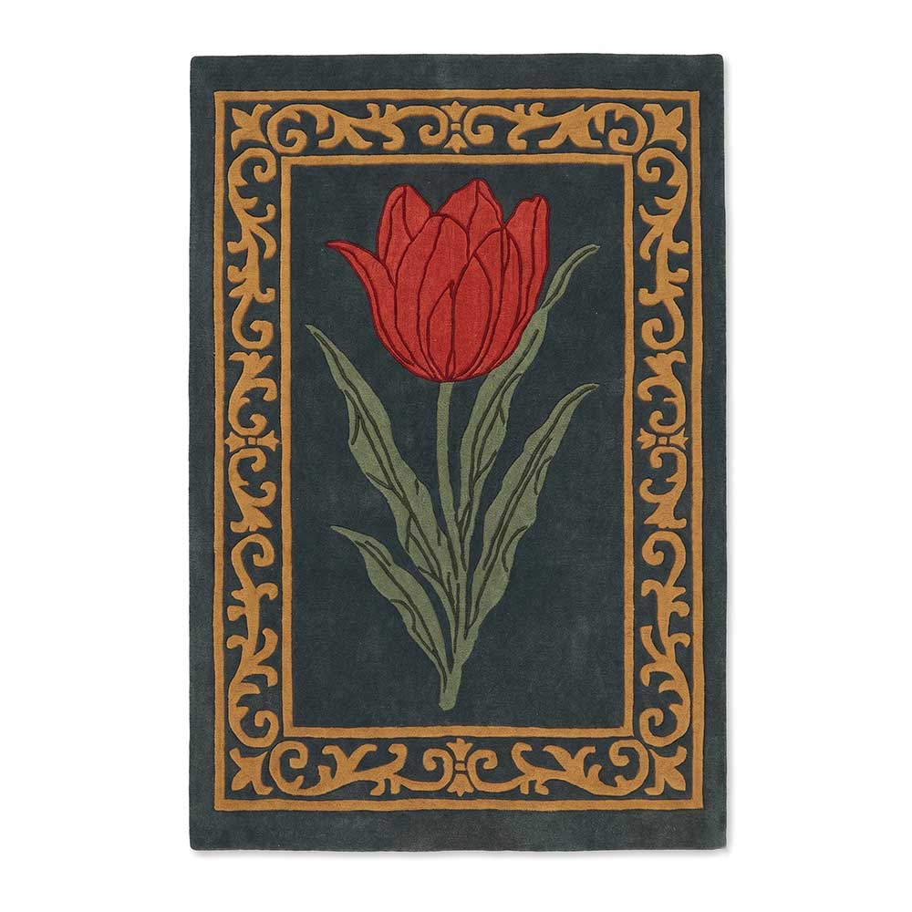 Hand-tufted New Zealand wool rug with a central red tulip design and ornate golden border on a dark charcoal background.