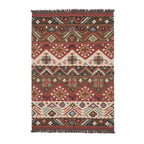 Artisanal hand-woven Mirzapur Kilim wool rug with geometric Southwestern patterns in earth tones, top-down view