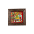 Front view of a handcrafted elephant stone painting featuring vibrant colors and a dark wooden frame.