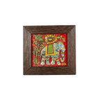 Front view of a handcrafted elephant stone painting featuring vibrant colors and a dark wooden frame.