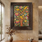 Close-up detail of hand-carved floral and bird relief on textured painted stone wall art