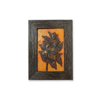 Front view of a handcrafted floral relief stone painting featuring a 3D bronze-tone flower in a dark rustic wood frame.