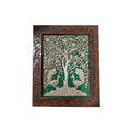 Front view of a handcrafted embossed stone painting featuring peacocks and a tree of life in an ornate wooden frame.