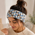 Woman wearing a handmade blue and cream multi-color ribbed knit ear warmer headband