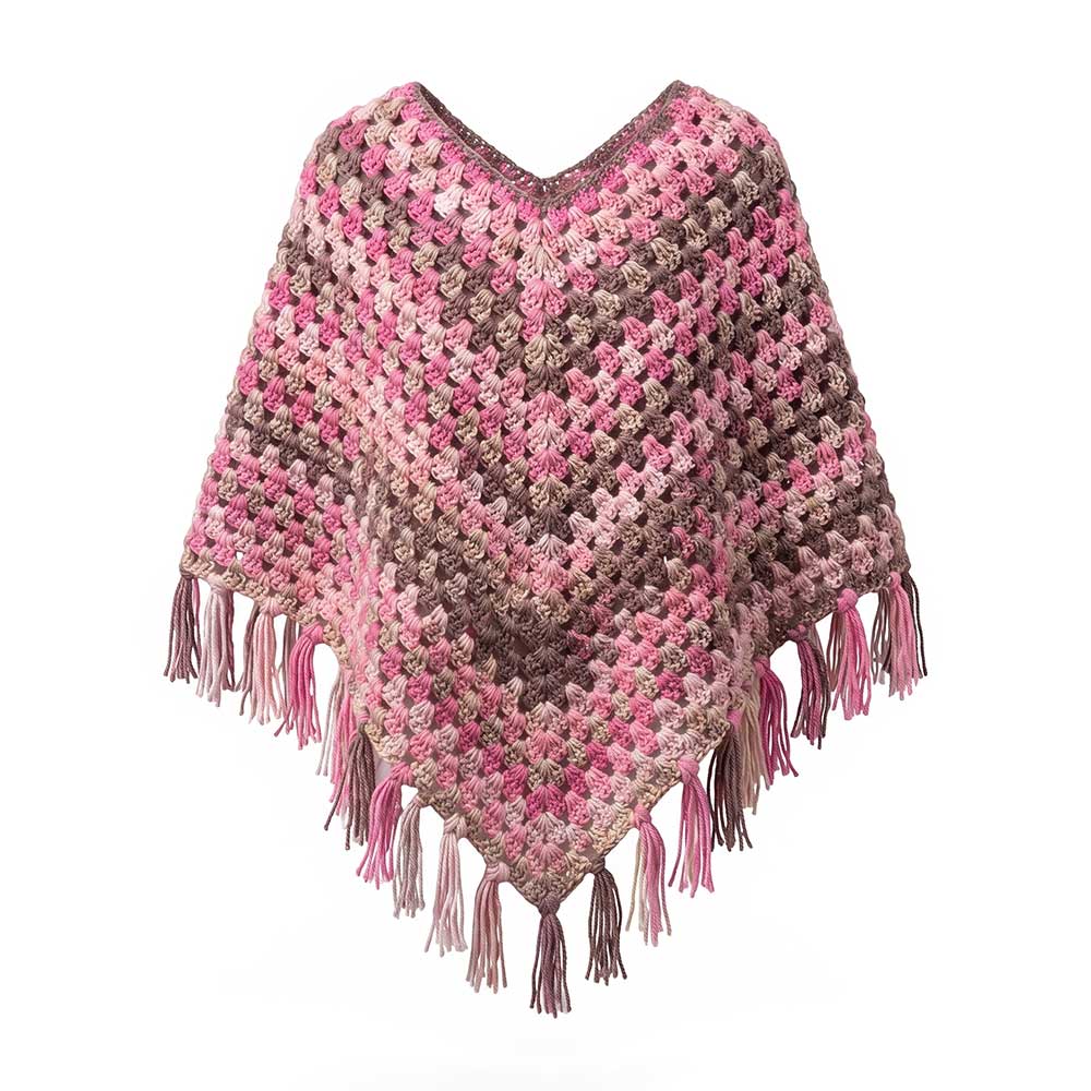 Handmade crochet granny square poncho in pink, taupe, and beige with fringe hem against a clean white background