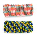 Set of two handmade crocheted headbands, one with multi-color sunset hues and one with primary colors.