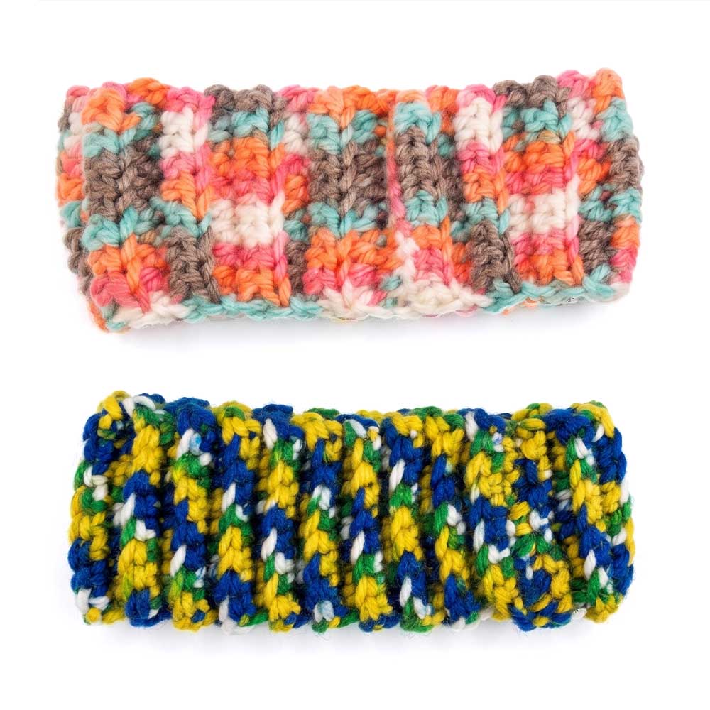 Set of two handmade crocheted headbands, one with multi-color sunset hues and one with primary colors.