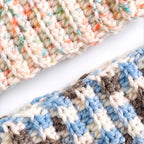 Close up detail of the textured ribbed knit pattern on the blue and pastel crochet headbands
