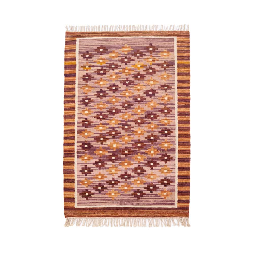 Front view of a rectangular Mirzapur Kilim wool rug featuring a geometric pattern in earthy tones of plum and terracotta with fringed edges.