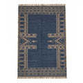 Full overhead view of a rectangular Mirzapur wool area rug in navy blue with natural geometric patterns and fringe edges.