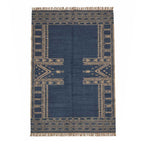 Full overhead view of a rectangular Mirzapur wool area rug in navy blue with natural geometric patterns and fringe edges.