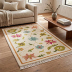 Mirzapur Carpets floral wool area rug styled in a modern living room setting next to sofa and wooden coffee table