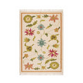 Full top-down view of Mirzapur Carpets 5x8 hand-tufted wool area rug with multi-color floral motif and ivory background