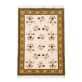 Front view of handcrafted Mirzapur wool area rug with floral motifs and olive-green border.