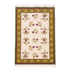 Front view of handcrafted Mirzapur wool area rug with floral motifs and olive-green border.