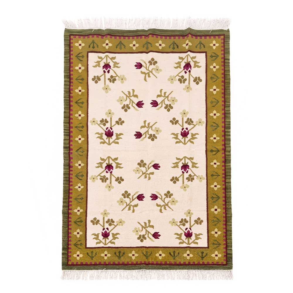 Front view of handcrafted Mirzapur wool area rug with floral motifs and olive-green border.