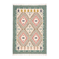 Full top flat-lay view of the Mirzapur handcrafted geometric flatweave area rug featuring sage green border, pink diamond patterns, and fringe tassels