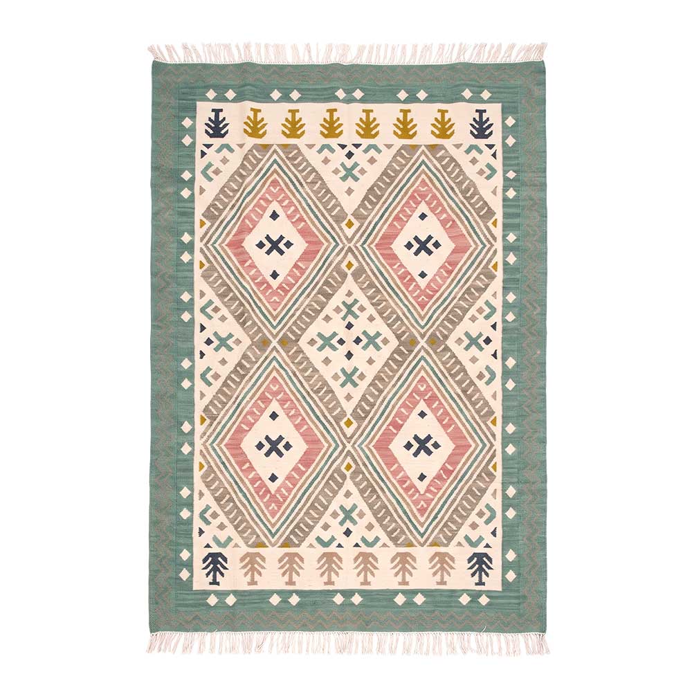 Full top flat-lay view of the Mirzapur handcrafted geometric flatweave area rug featuring sage green border, pink diamond patterns, and fringe tassels