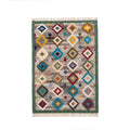 Front view of an authentic hand-knotted Mirzapur wool rug with a colorful geometric diamond pattern and decorative green border.