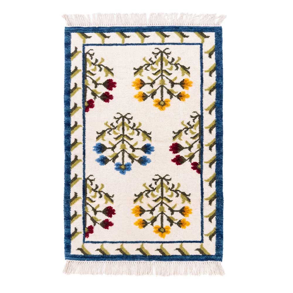 Mirzapur hand-tufted wool rug in 5x8 feet featuring classic Mughal tree of life floral motifs in yellow, blue, and red on a cream field with a royal blue border.