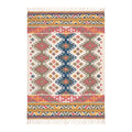 Mirzapur handwoven geometric flatweave kilim rug with coral, blue, and green diamond patterns and white fringe