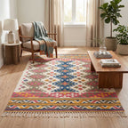 Angled perspective view of Mirzapur flatweave bohemian area rug styled in home interior