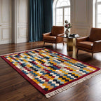 Close-up of the fringe and signature deep-red border detail on the Mirzapur artisanal area rug.