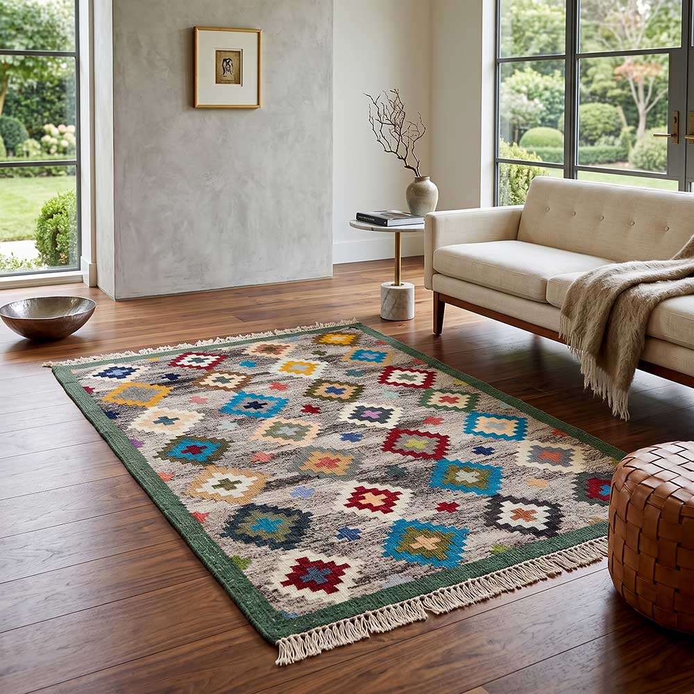 Perspective shot showing the decorative fringe and border of the Mirzapur wool rug.
