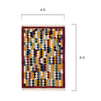 Close-up detail of the hand-woven diamond pattern and natural fiber texture of the Mirzapur rug.