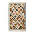 Full top-down view of a rectangular Mirzapur wool kilim rug featuring a colorful Southwestern-inspired geometric pattern with fringe.