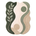 Front view of an organic wave-shaped area rug featuring a green botanical leaf design and sage earth tones, made from New Zealand wool.