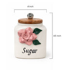 Ceramic sugar container with a pink rose design and wooden lid, showing measurements.