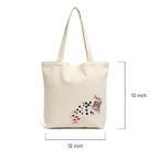 Beige tote bag with playing card design 
