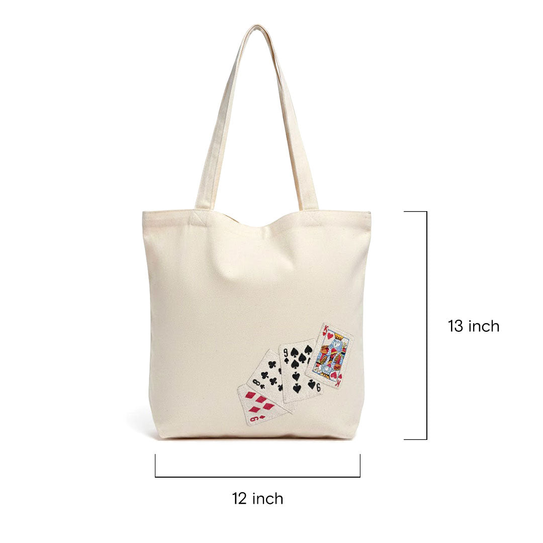 Beige tote bag with playing card design 