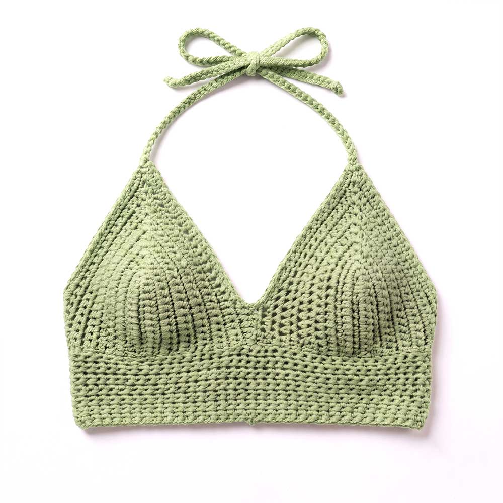 Model wearing light purple crochet bikini top.